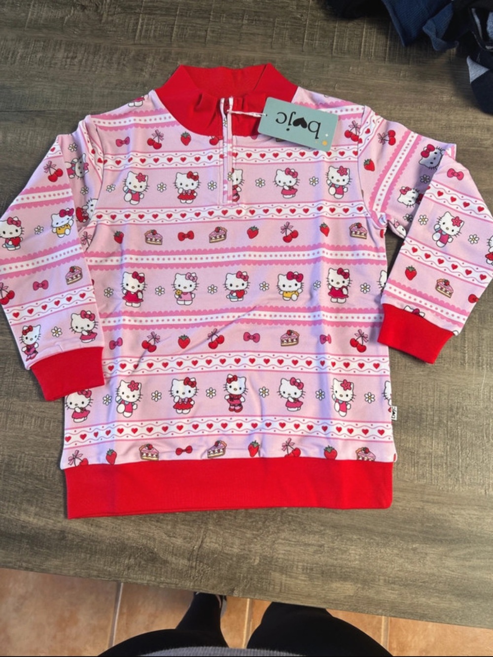Hello Kitty Pink Bamboo Pullover Top with Red Trim - Kids
